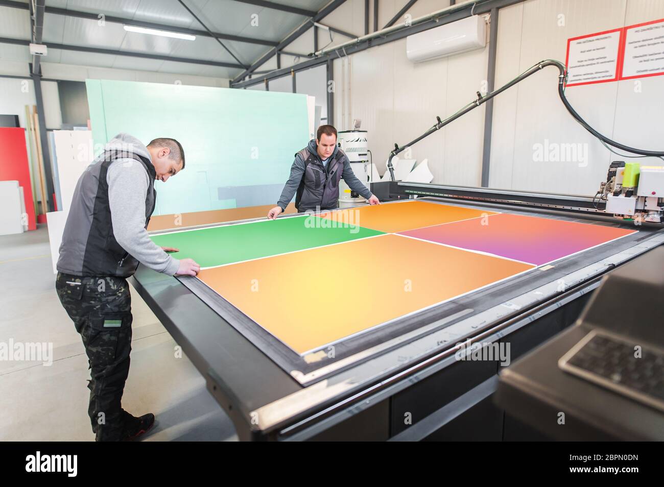 Modern robot works factory machine hi-res stock photography and images ...