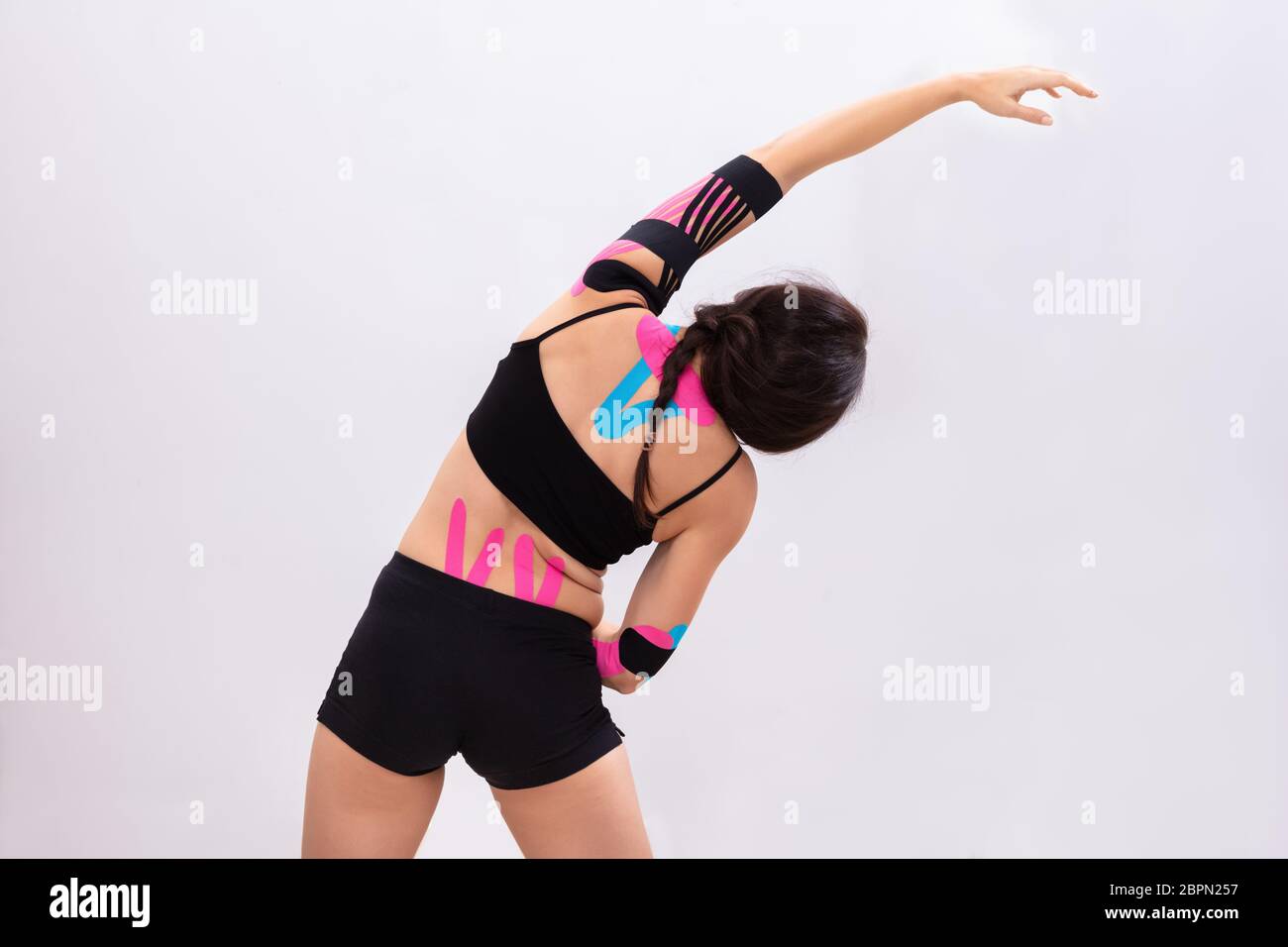 Back woman stretching arms hi-res stock photography and images - Alamy