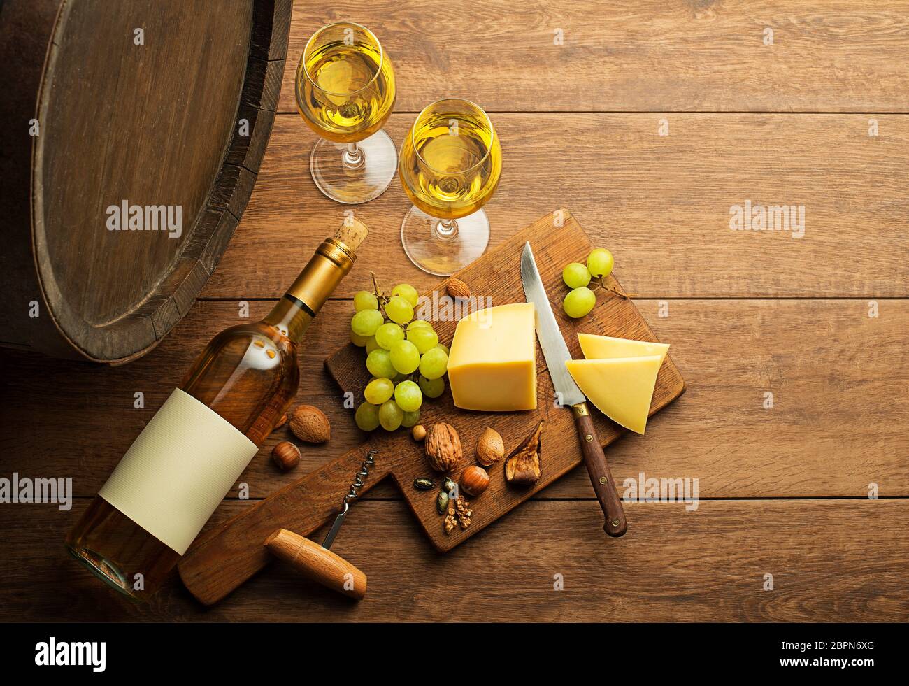 Download Bottle Of White Wine With Snack Food On Old Board And Barrel Wine Bottle Mockup Stock Photo Alamy