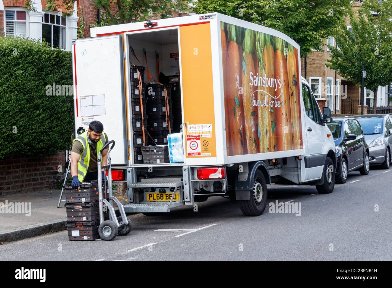delivery driver unloading shopping 