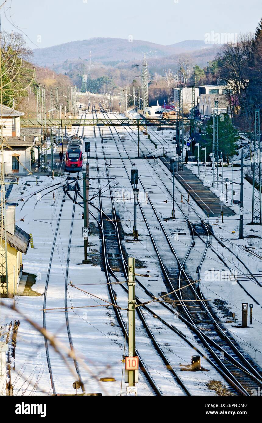 arial view on  train station with snow-covered track layout at winter, Rekawinkel, Austria Stock Photo