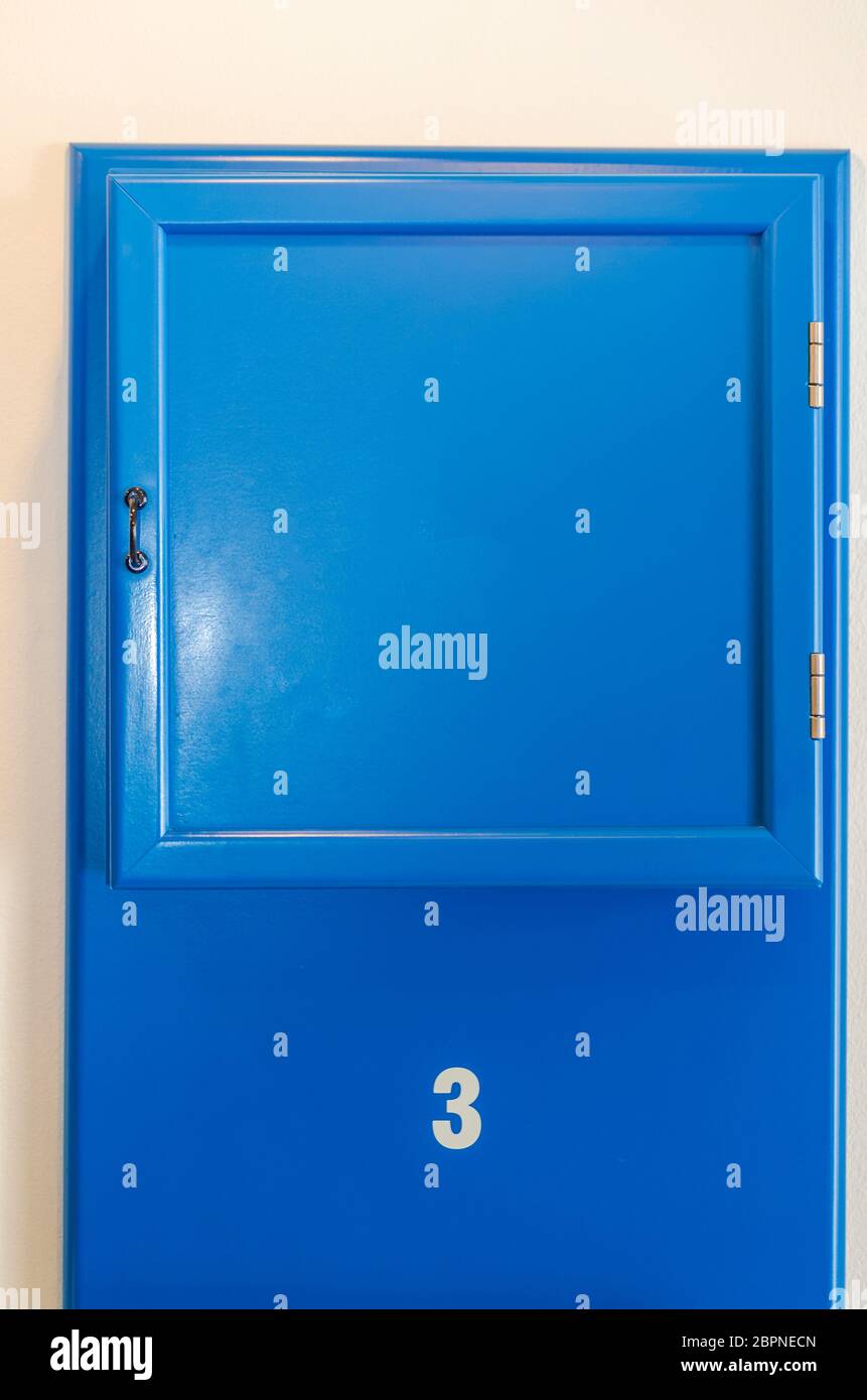 Blue small cabinet door collection with numeral Stock Photo