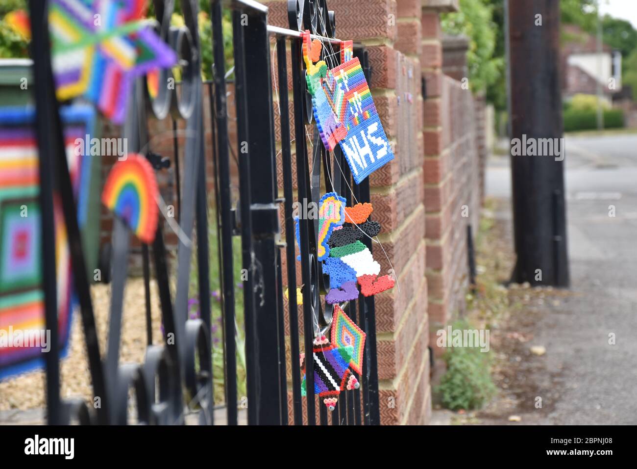 Oxford, Oxfordshire UK - 05 17 20: Rainbow signs have become very popular as a sign of hope amid the Cornovirus Lockdown. Here plastic signs are hung Stock Photo