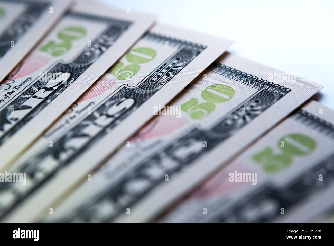 Macro phtot of new 50 US dollar banknotes. Concept image for inflation, business, finance, banking or currency exchange. Stock Photo