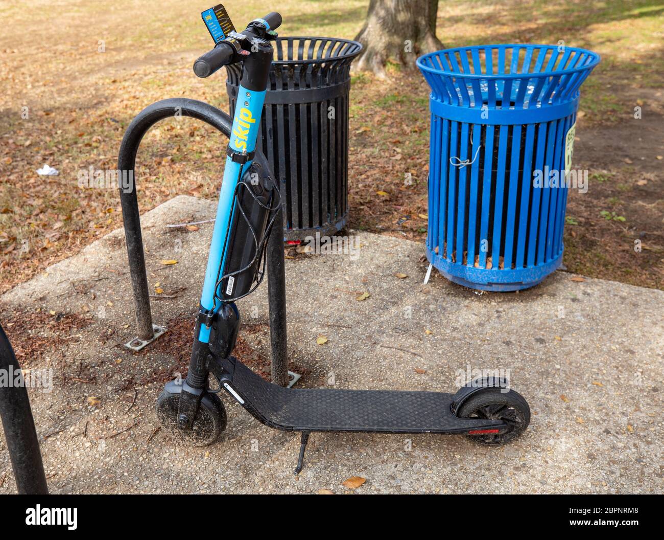 scooter in DC by trash cans Stock Photo Alamy