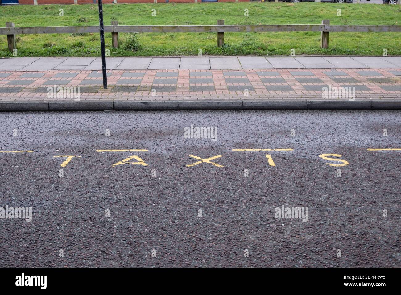 painted marking on road indicating taxi rank in Birkenhead Wirral January 2020 Stock Photo