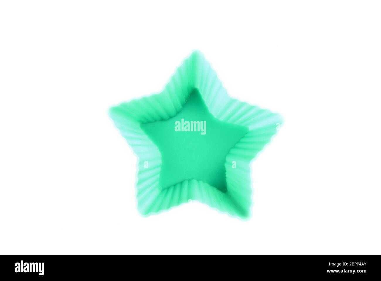 Silicone star shaped cookie baking dish isolated on a white background. Stock Photo