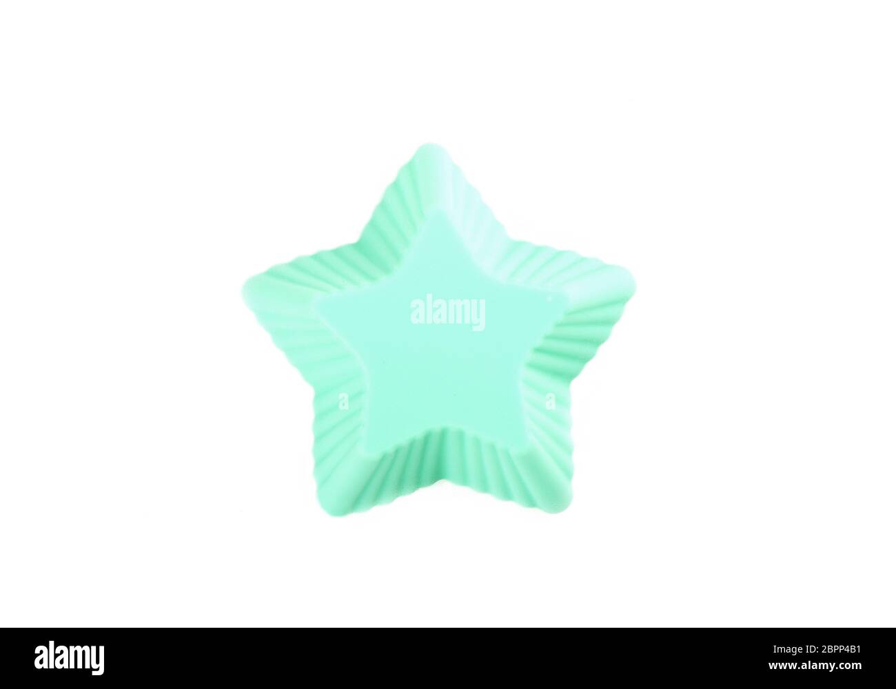 Silicone star shaped cookie baking dish isolated on a white background. Stock Photo