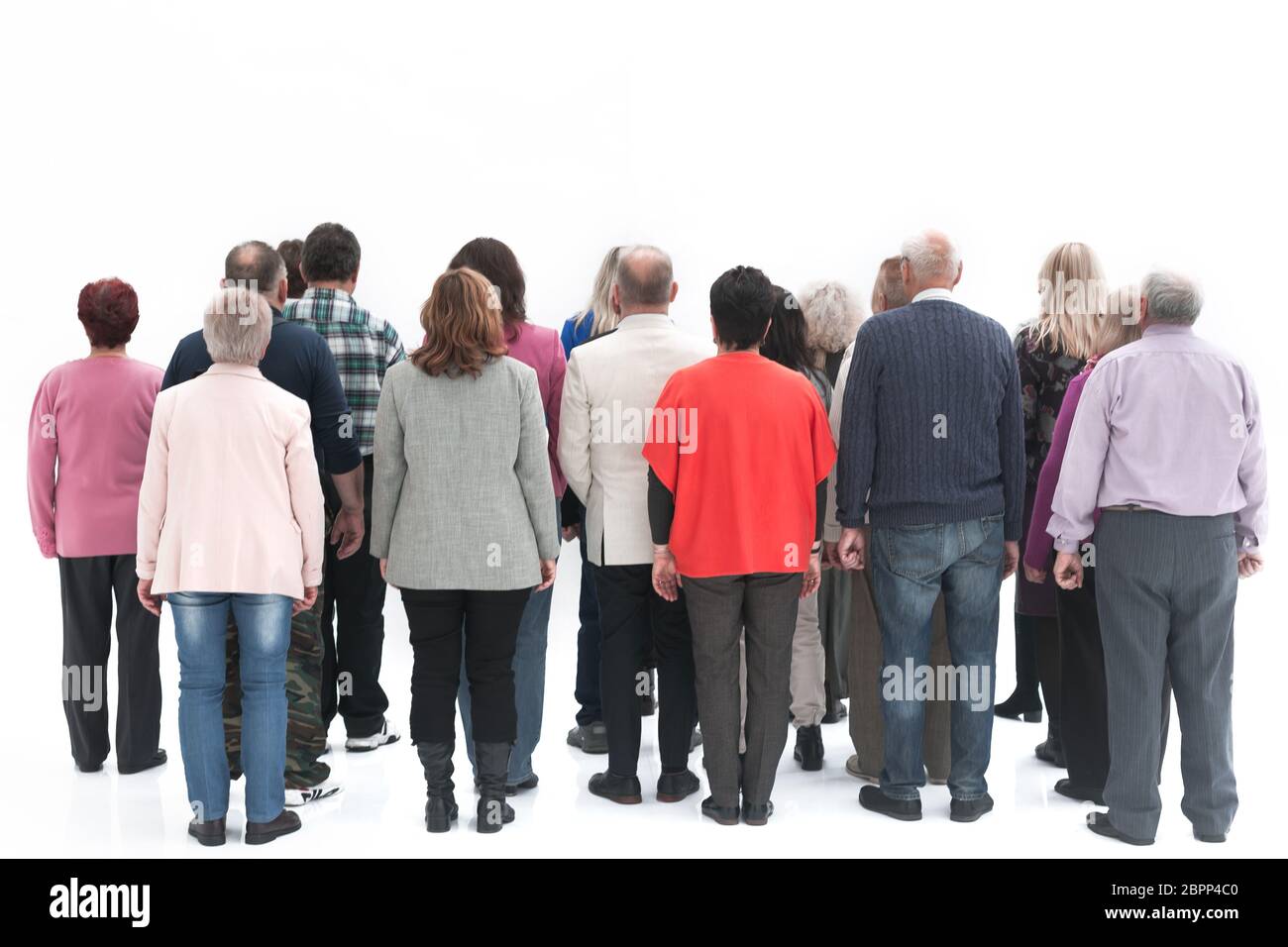 Rear view of a casual group of elderly people isolated over a white background Stock Photo
