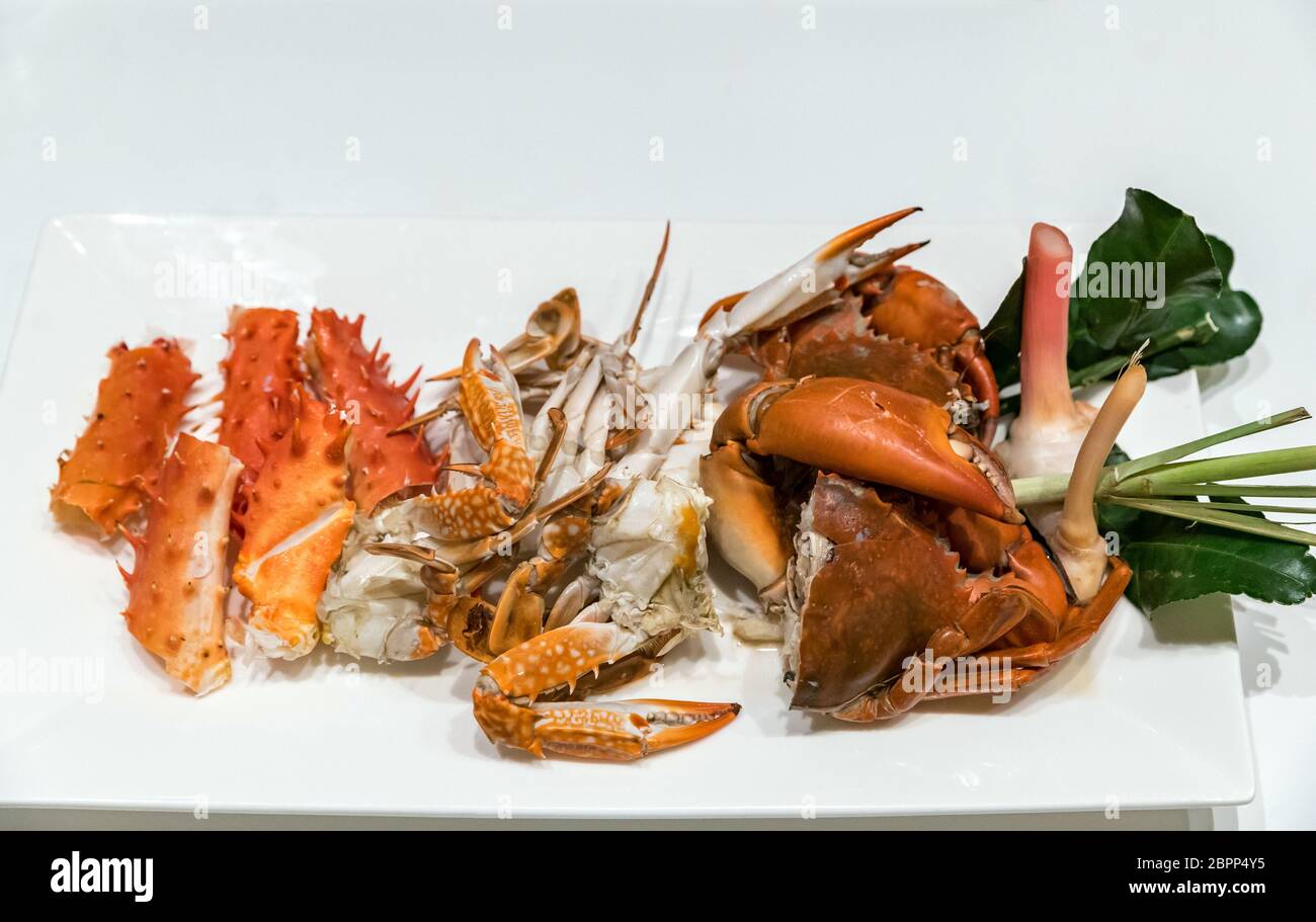 variety of Steam crab in white dish Stock Photo