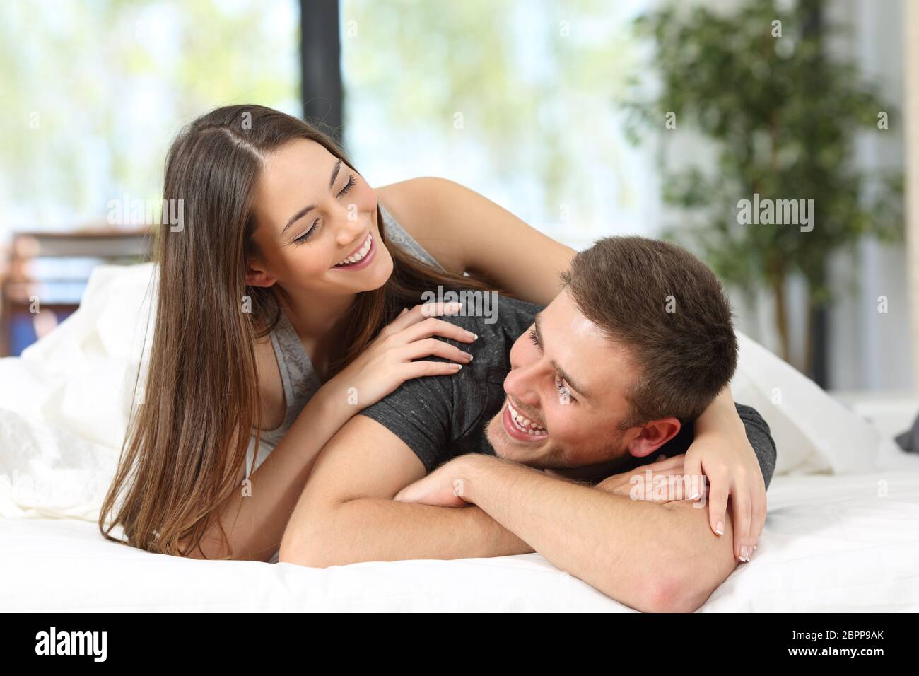 Husband flirting wife bedroom romantic hi-res stock photography and images 