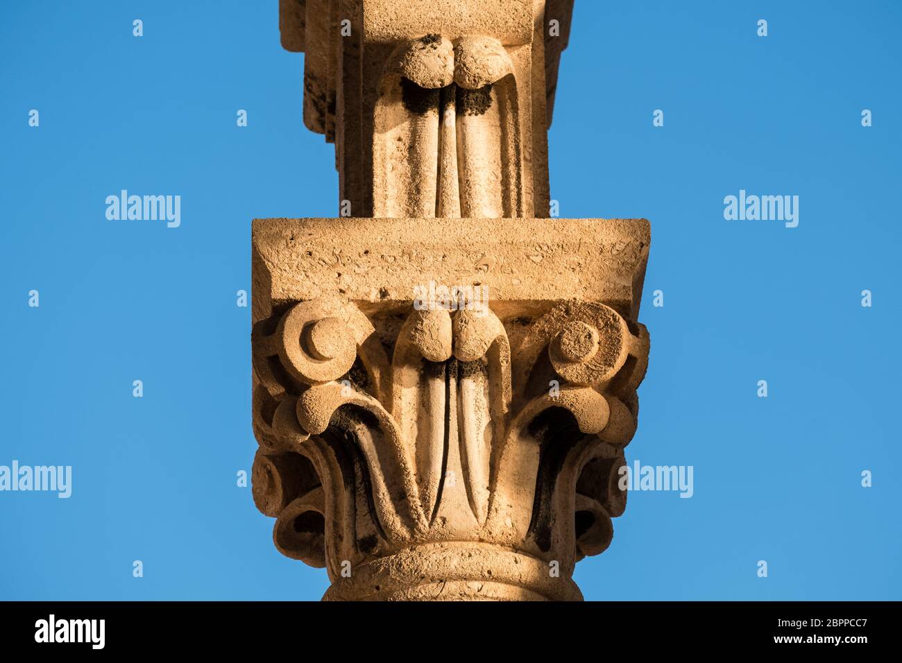 Close-up detail of a carved stone pillar at Saint Domnius Bell Tower in Split's Old Town, Croatia Stock Photo