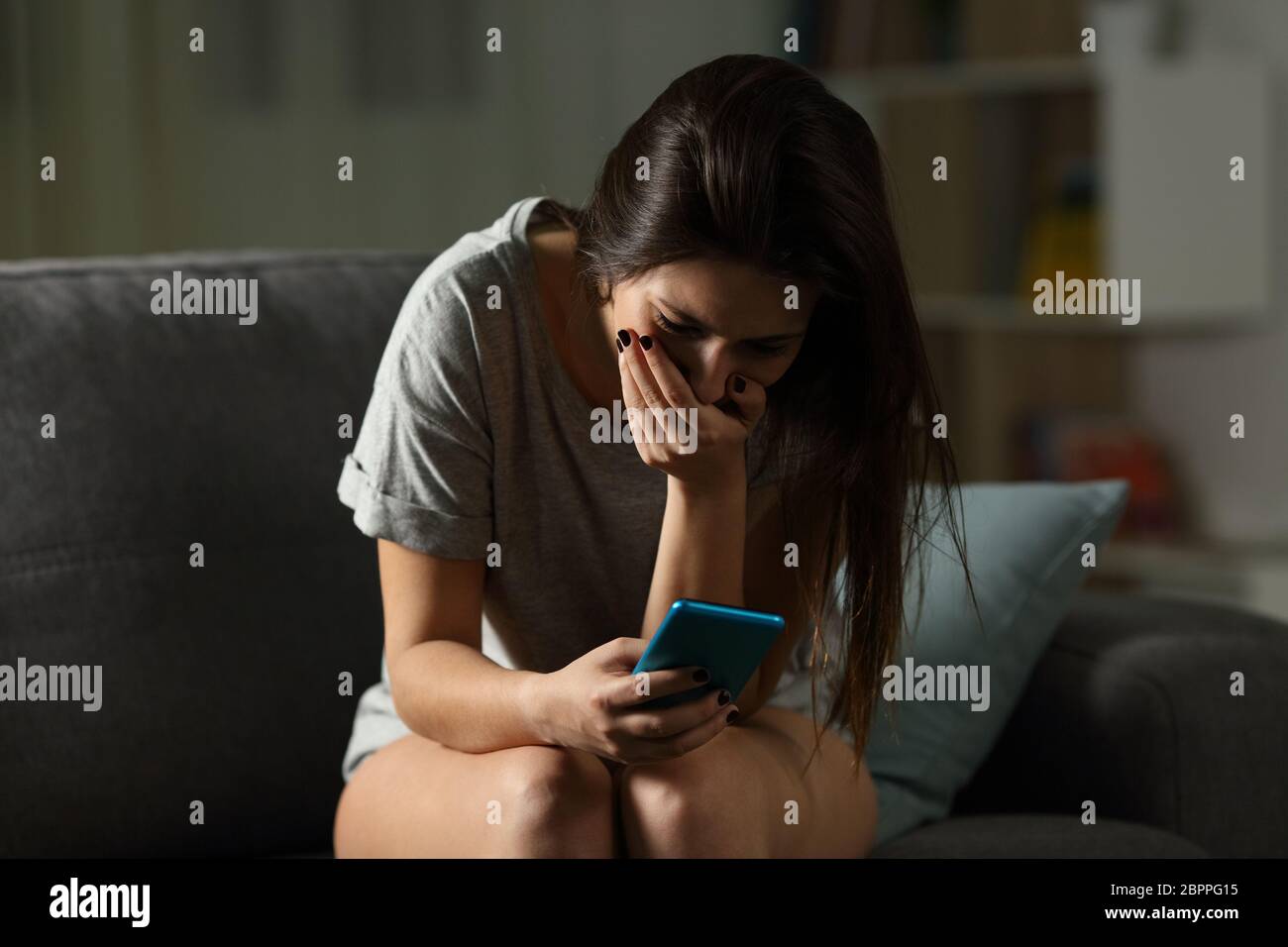 Sad man has bad online chat news and feels disappointed on the smartphone.  Stock Photo by ©sevendeman 506404148