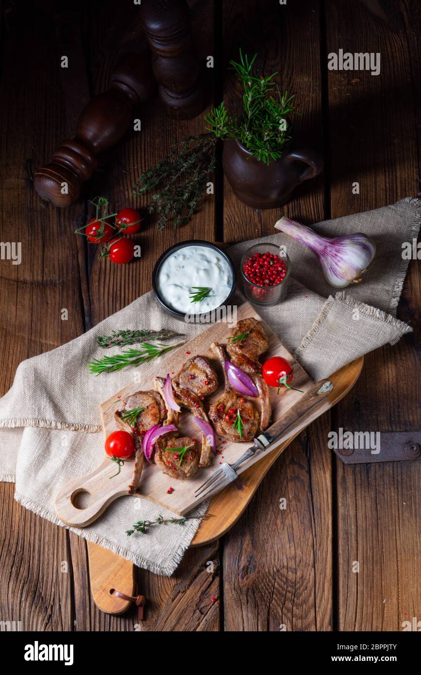 Tasty Lamb chops with mint and rosemary Stock Photo Alamy