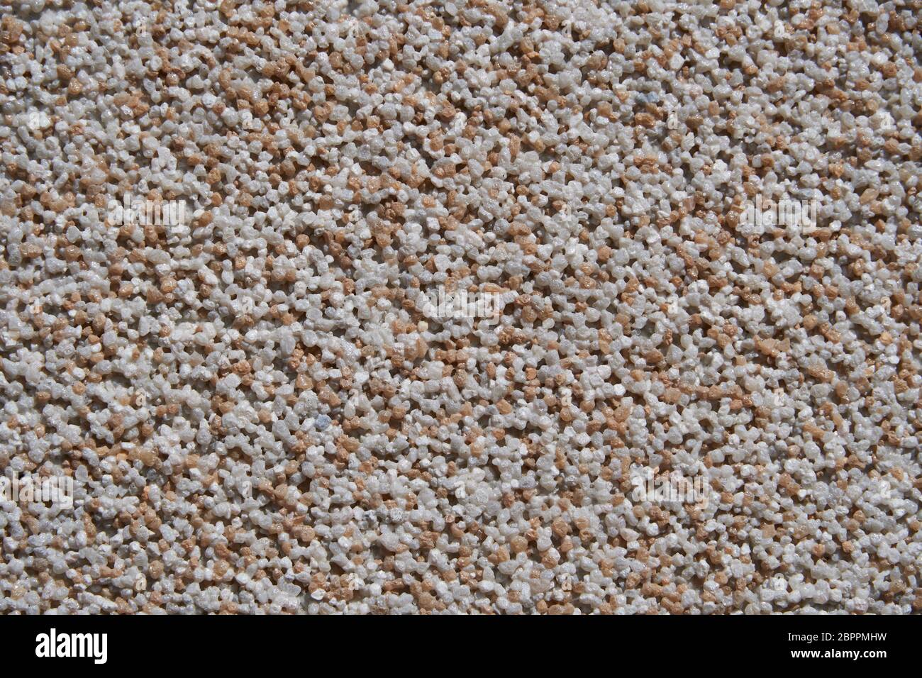 close view of the wall surface, decorative finishing, heat insulation granules or granite particles Stock Photo