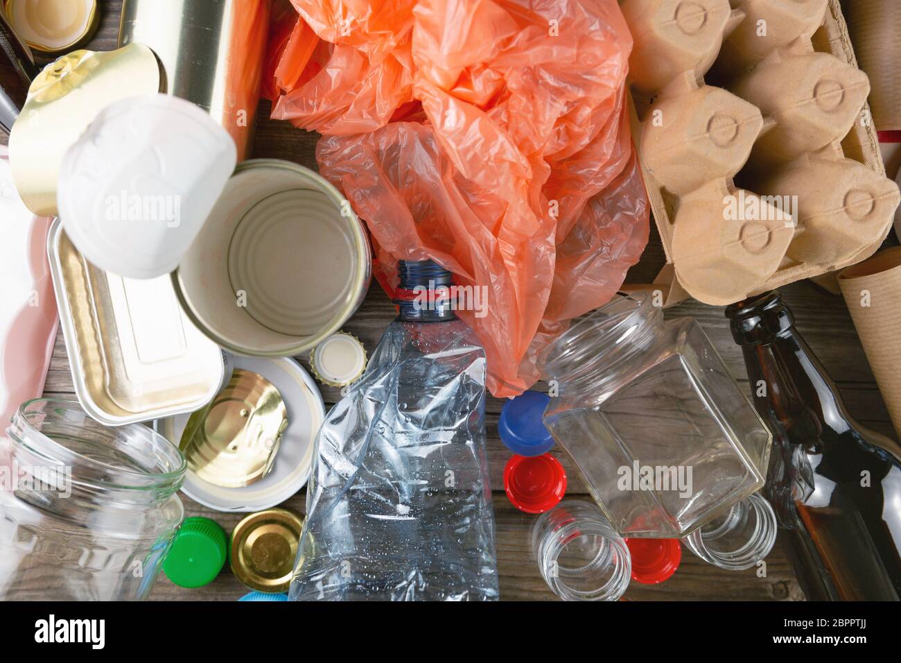 Plastic, glass, metal and paper garbage for recycling concept reuse and recycle. Copy space ...