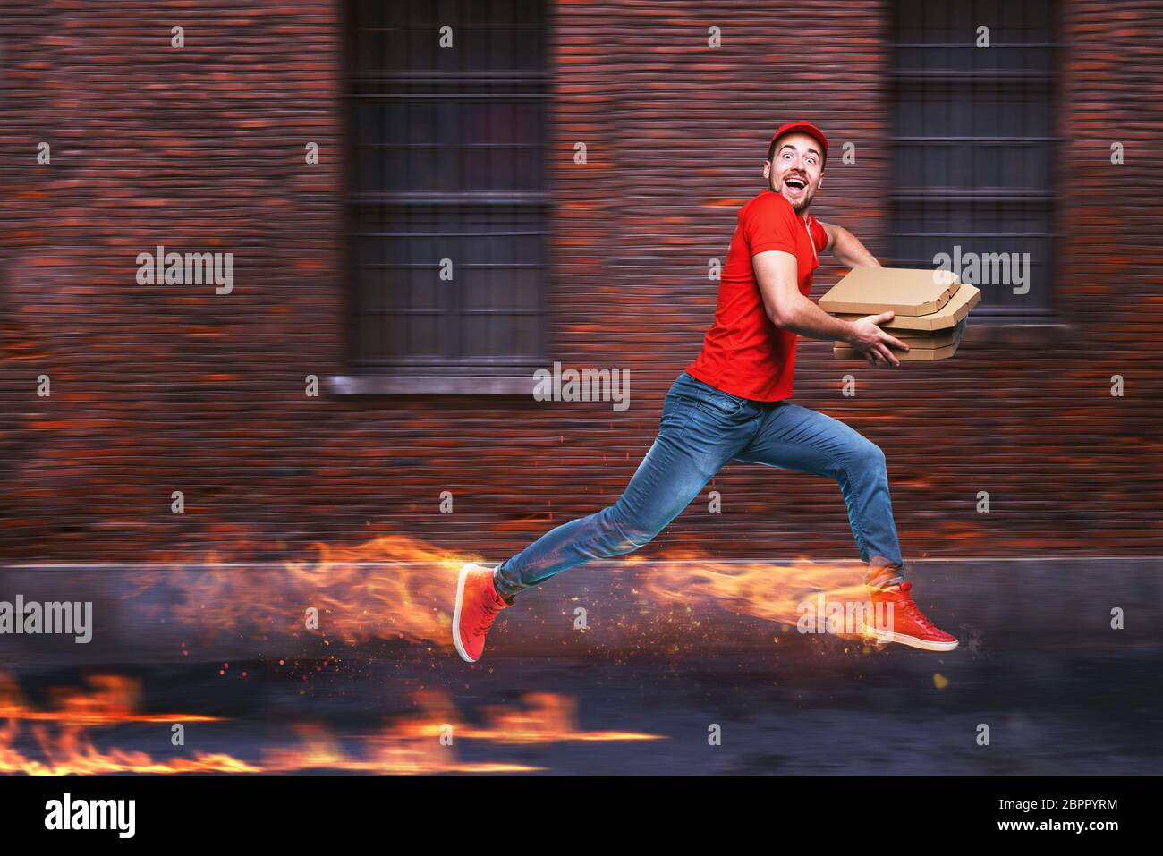 Courier runs fast to deliver quickly pizzas with fiery feet. Cyan background Stock Photo