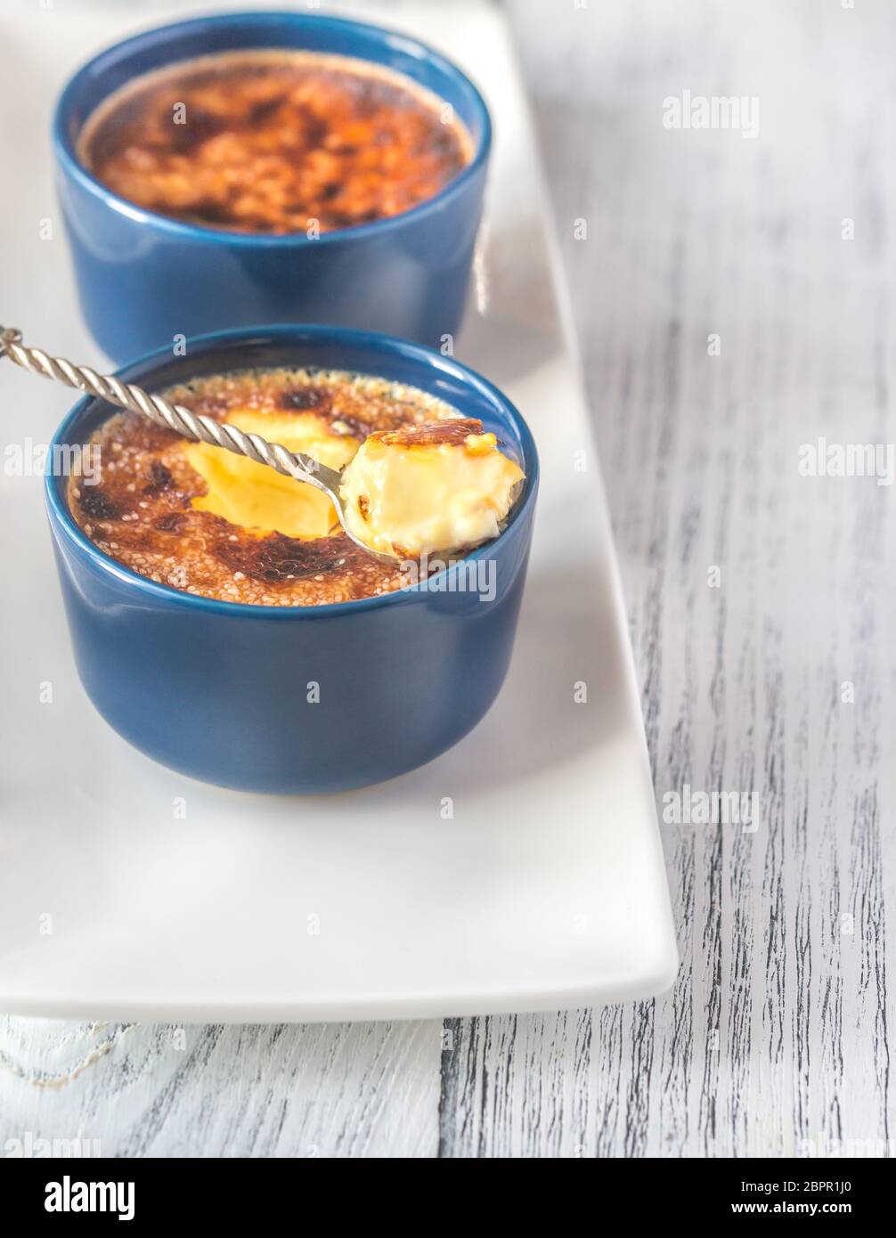 Creme brulee in the pots Stock Photo Alamy