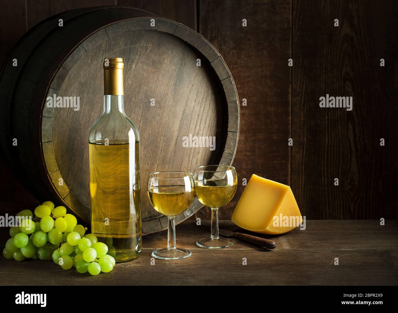 Download Bottle Of White Wine With Cheese Food On Old Board And Barrel Wine Bottle Mockup Stock Photo Alamy