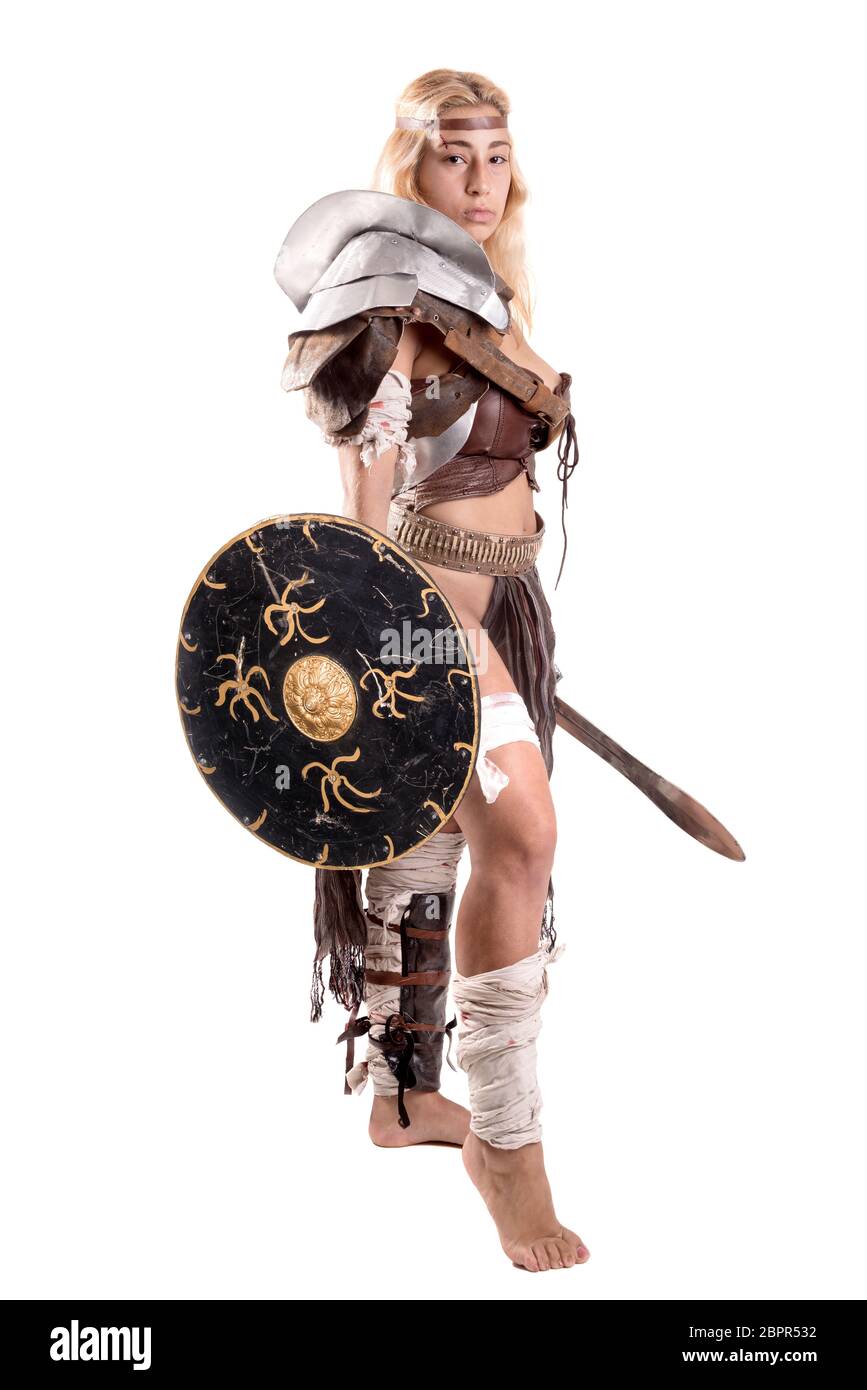 Ancient woman warrior or Gladiator posing with sword and shield ...