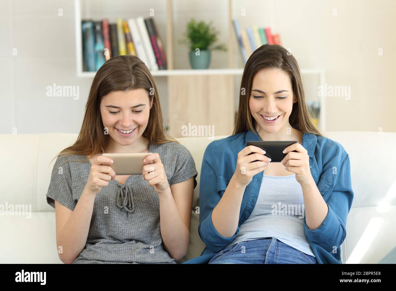 Men Relax By Playing Competitive Video Games As Friends In A Local Internet  Bar That Specializes In Online Gaming Stock Photo, Picture and Royalty Free  Image. Image 81203430.