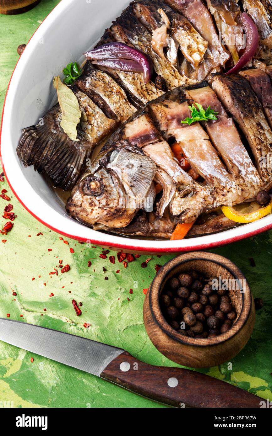 Loaded Fish Grilled whole fish loaded with citrus,vegetable and spices in baked ...