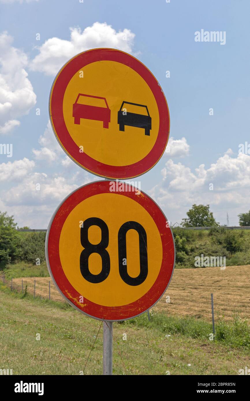 Two Round Limit Traffic Signs at Pole Stock Photo - Alamy