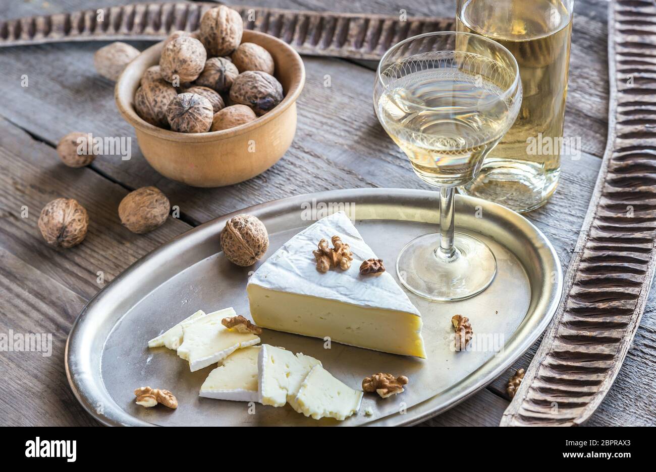Brie cheese with nuts Stock Photo Alamy