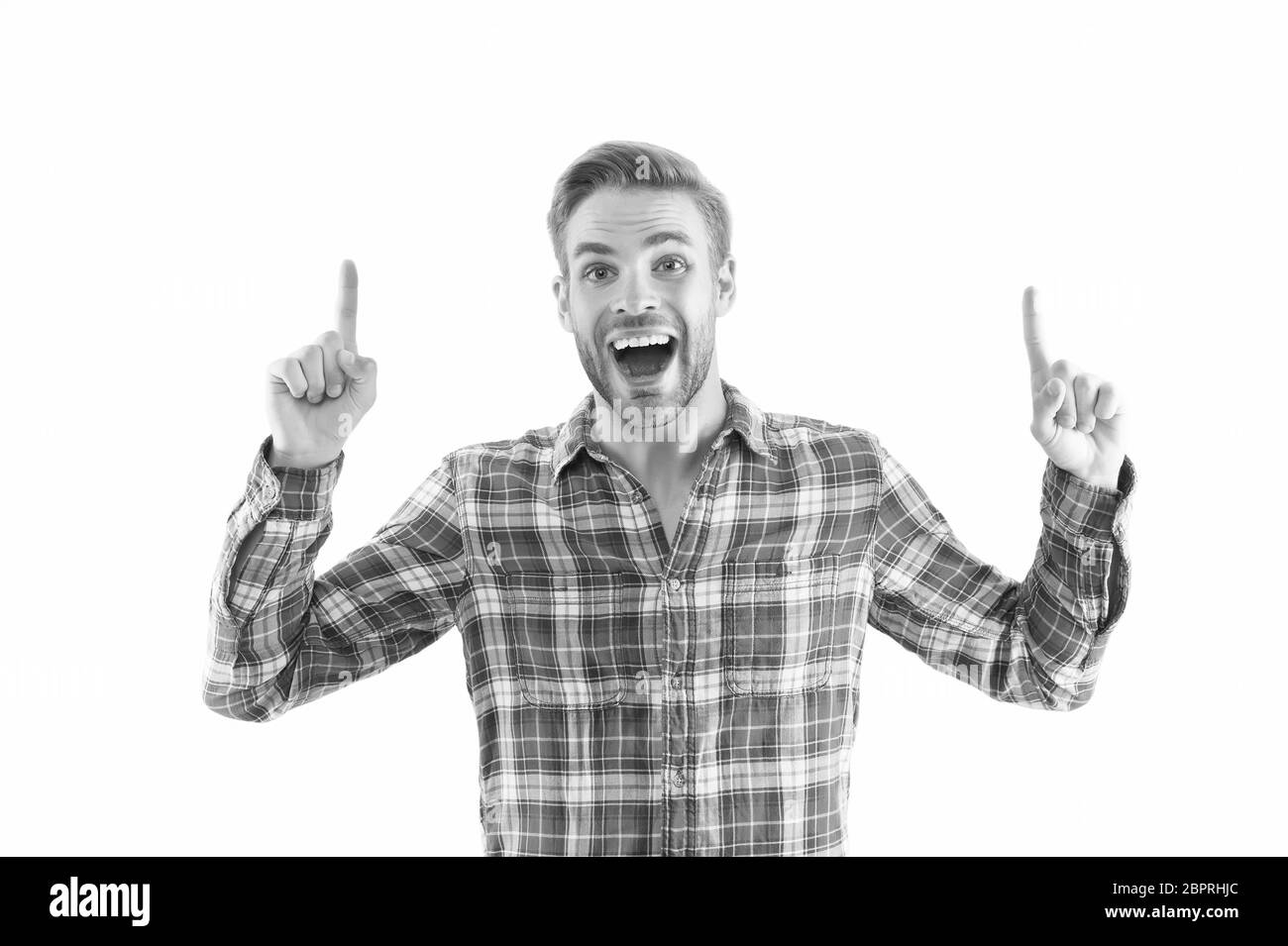 Man Point Out Check it out. Look there. Man pointing at copy space. Man muscular ...