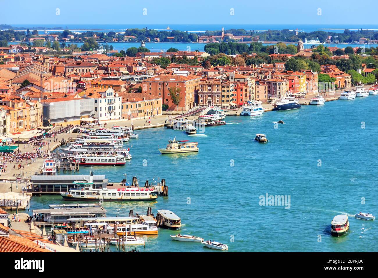 Venetian lagoon and a berth for gondolas and boats, Venice, Italy. Stock Photo