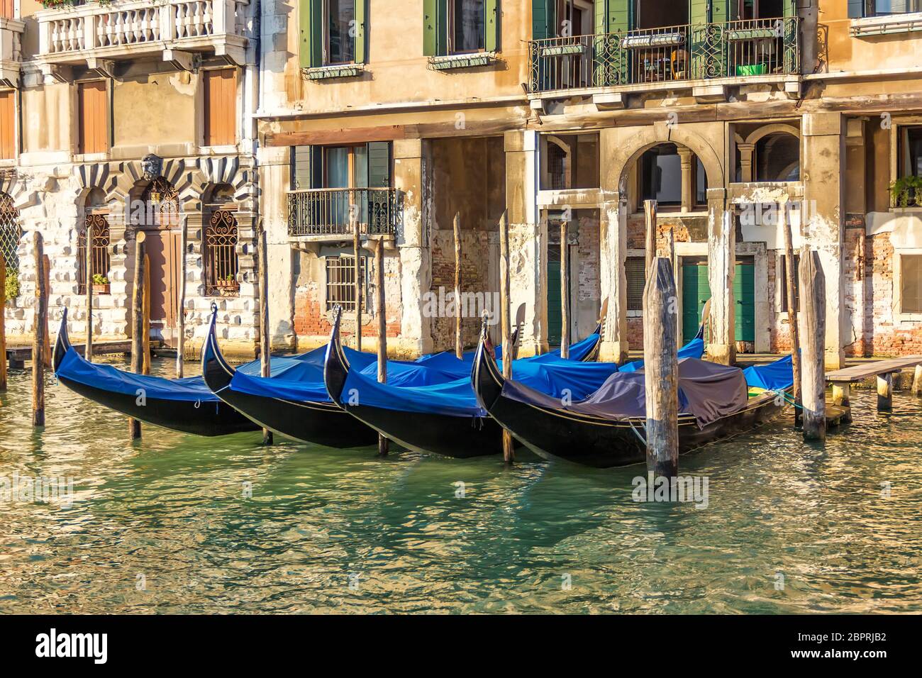 Gondolas moored in grand canal hi-res stock photography and images - Alamy