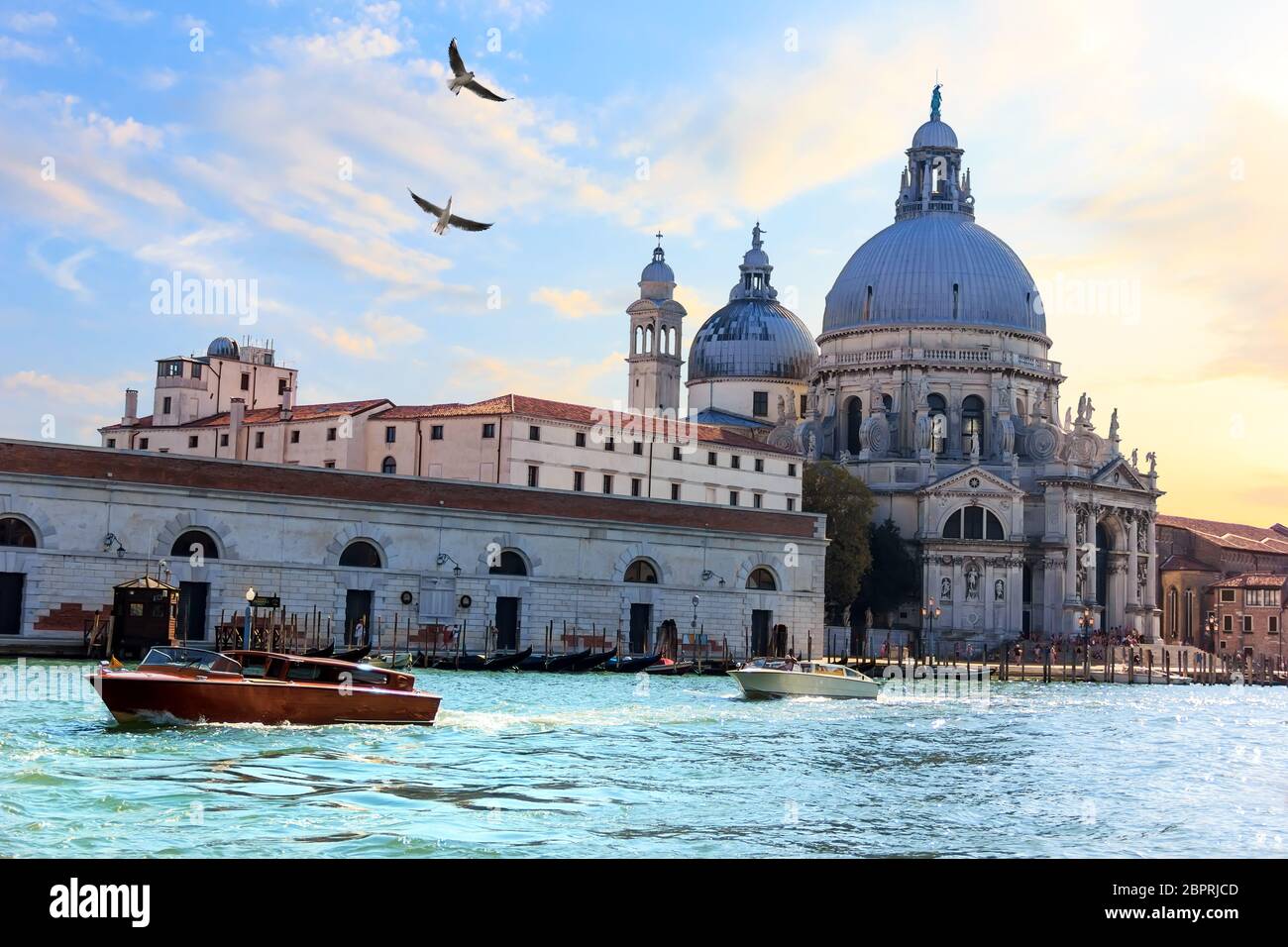 Venice lagoon view and Basilica of Santa Maria della Salute, Italy. Stock Photo