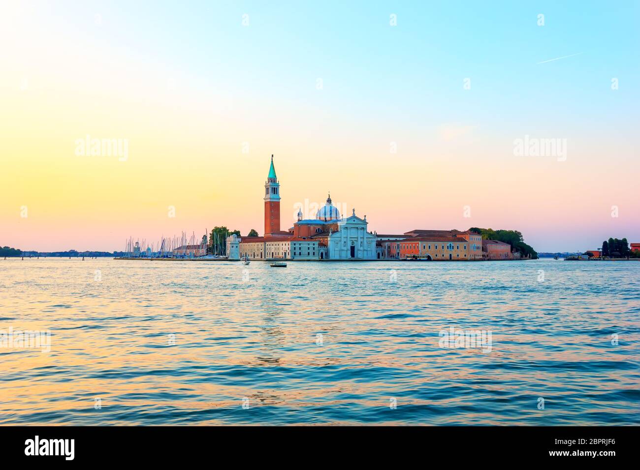 San Giorgio Maggiore island at sunrise, view from the pier near Doge's Palace. Stock Photo