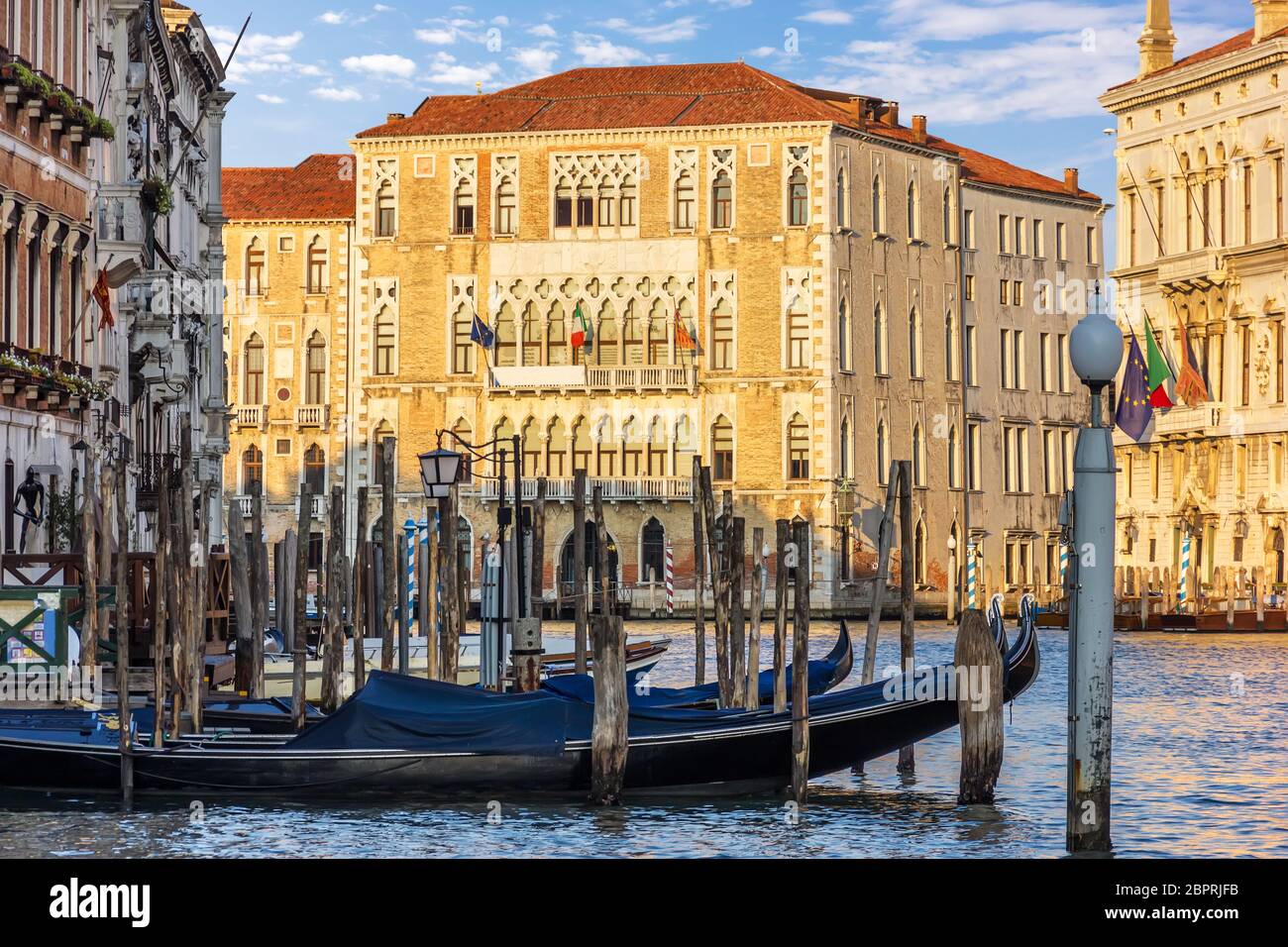 Gondolas moored in the Grand Canal near the University of Venice. Stock Photo