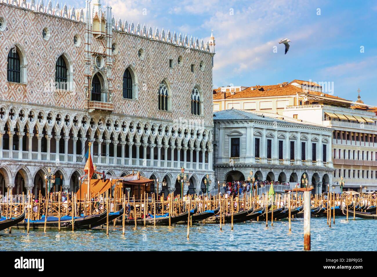 Doge's Palace and gondolas pier near Piazza San Marco, Venice, Italy. Stock Photo