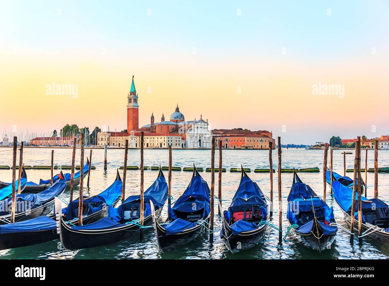 Venetian gondolas in front of San Giorgio Maggiore Island. Stock Photo