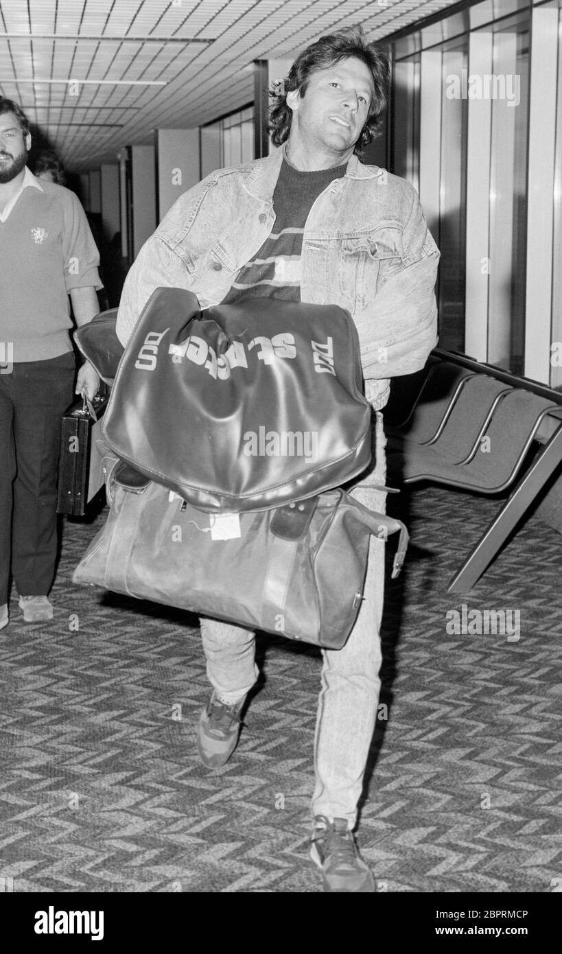 Imran Khan captain of the Pakistan International cricket team arriving at London's Heathrow Airport in 1987. Stock Photo