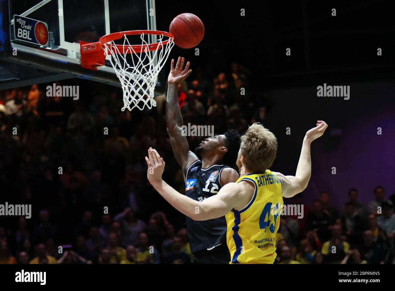 Braunschweig, Germany, December 27, 2019:Quincy Ford of Merlins Crailsheim score a point during the Basketball BBL Bundesliga match Stock Photo