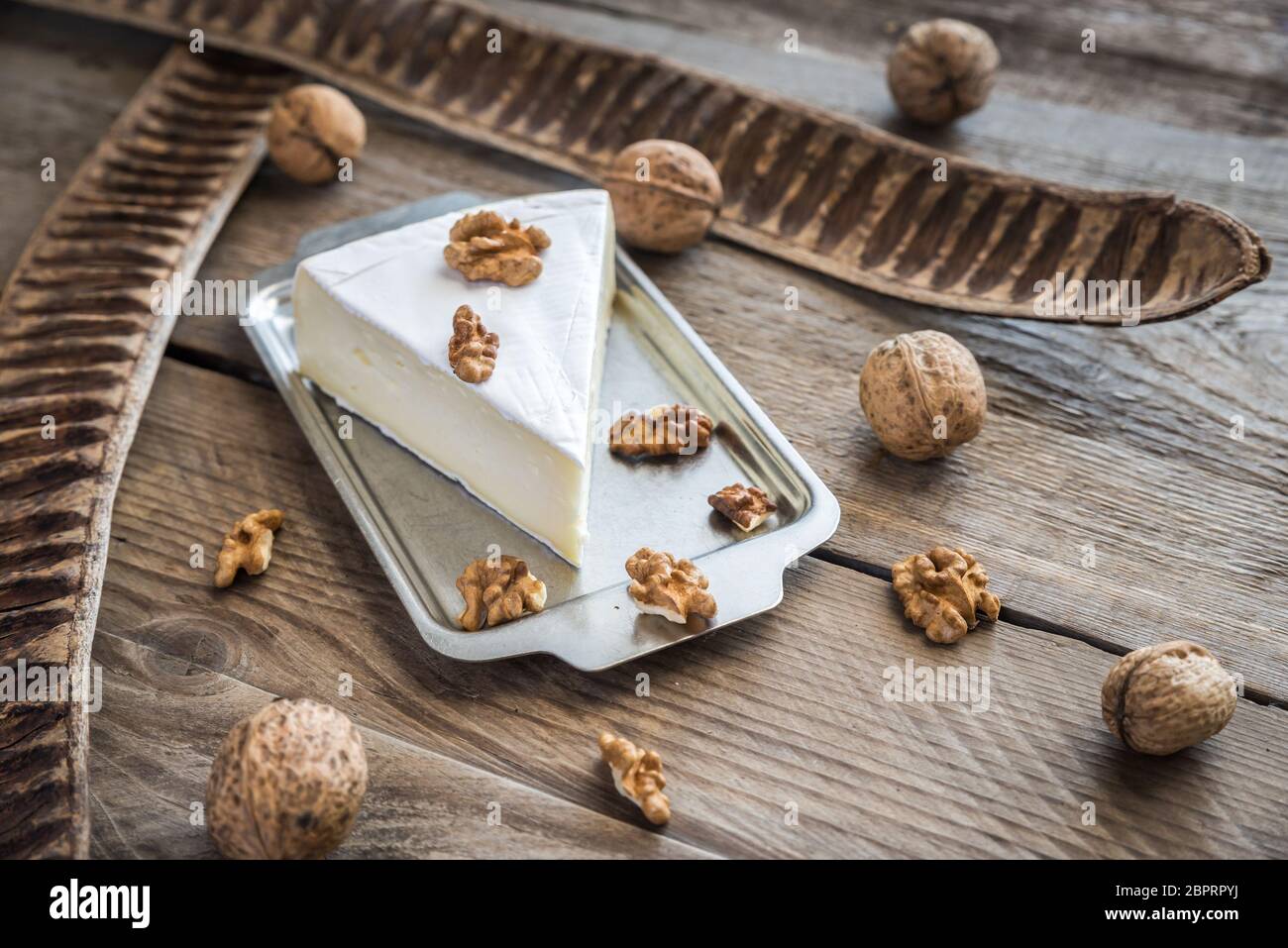 Brie cheese with nuts Stock Photo Alamy