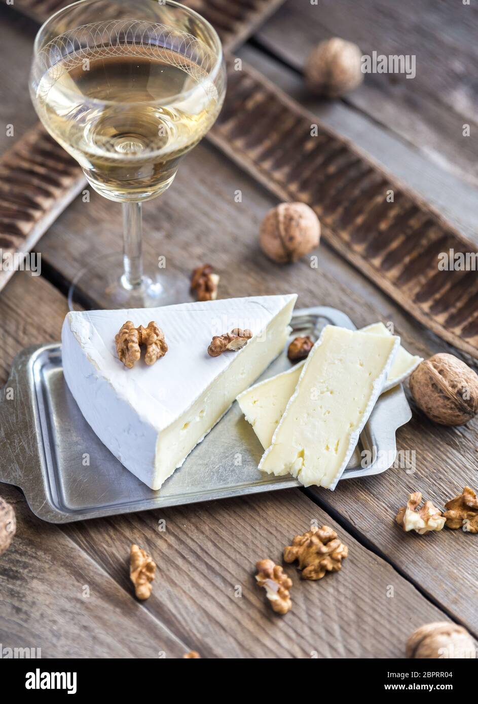 Brie cheese with nuts Stock Photo Alamy