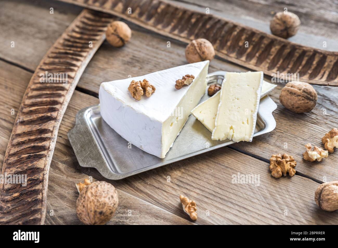 Brie cheese with nuts Stock Photo Alamy