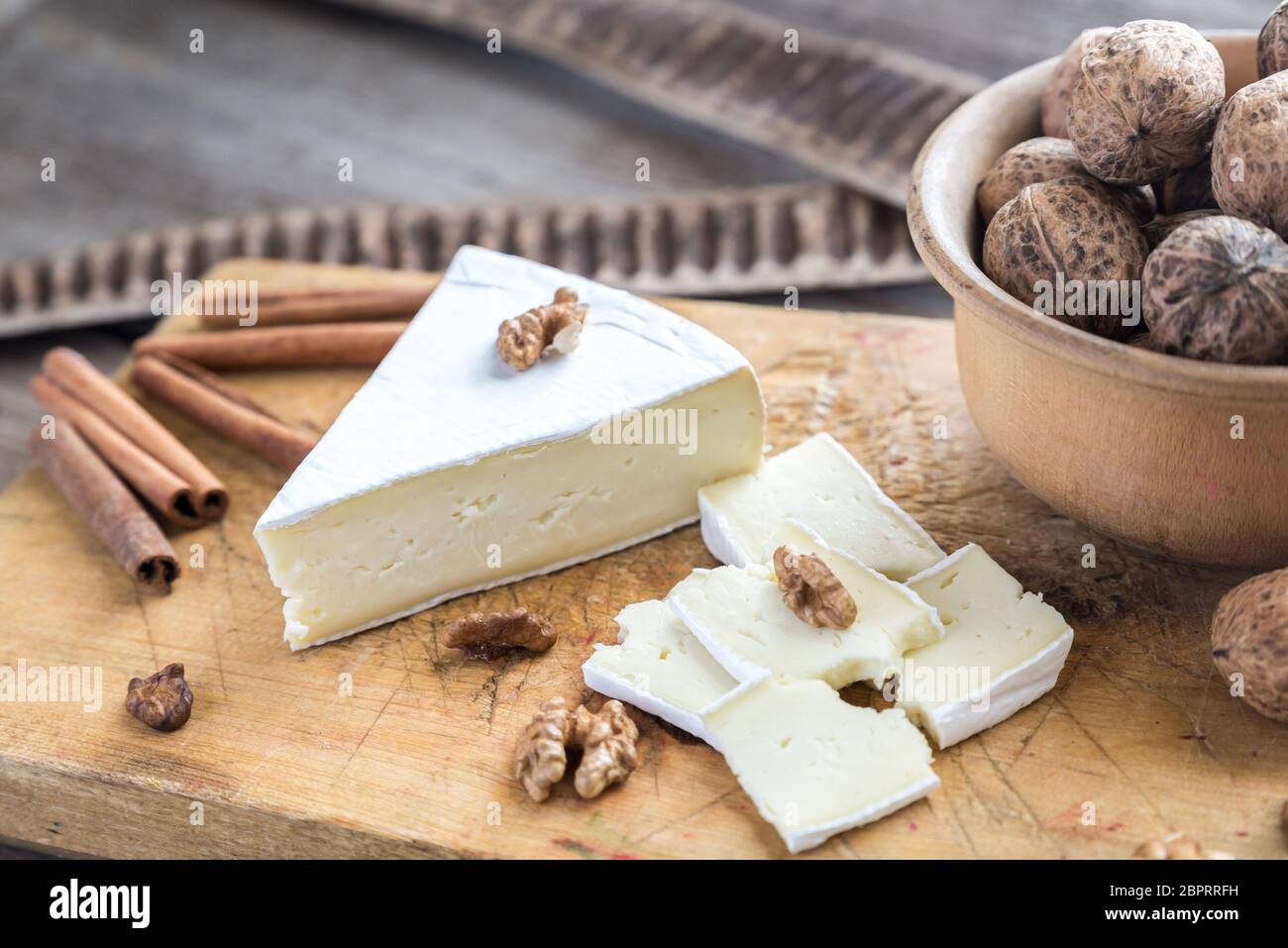 Brie cheese with nuts Stock Photo Alamy