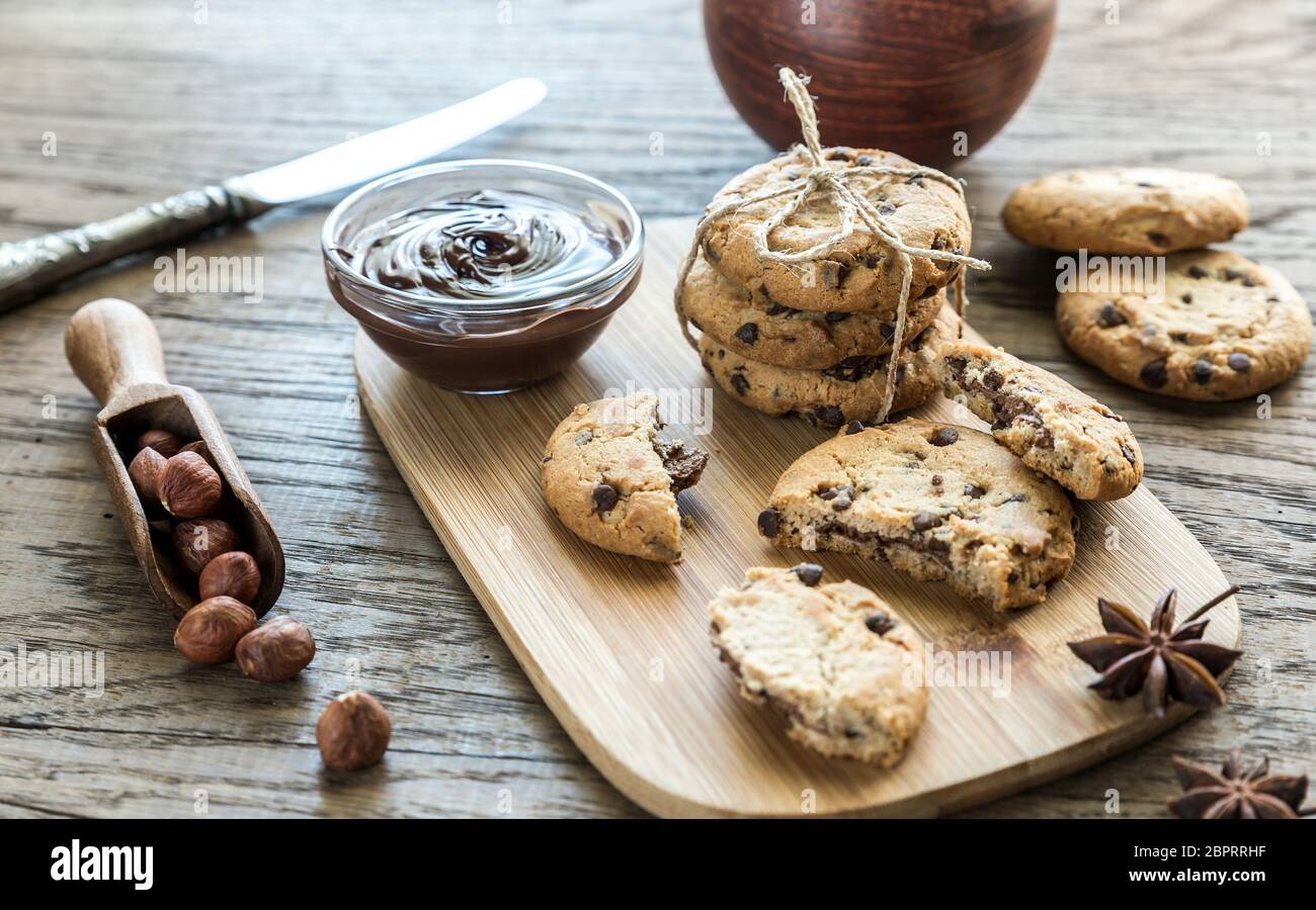 Cookies with chocolate cream and hazelnuts Stock Photo
