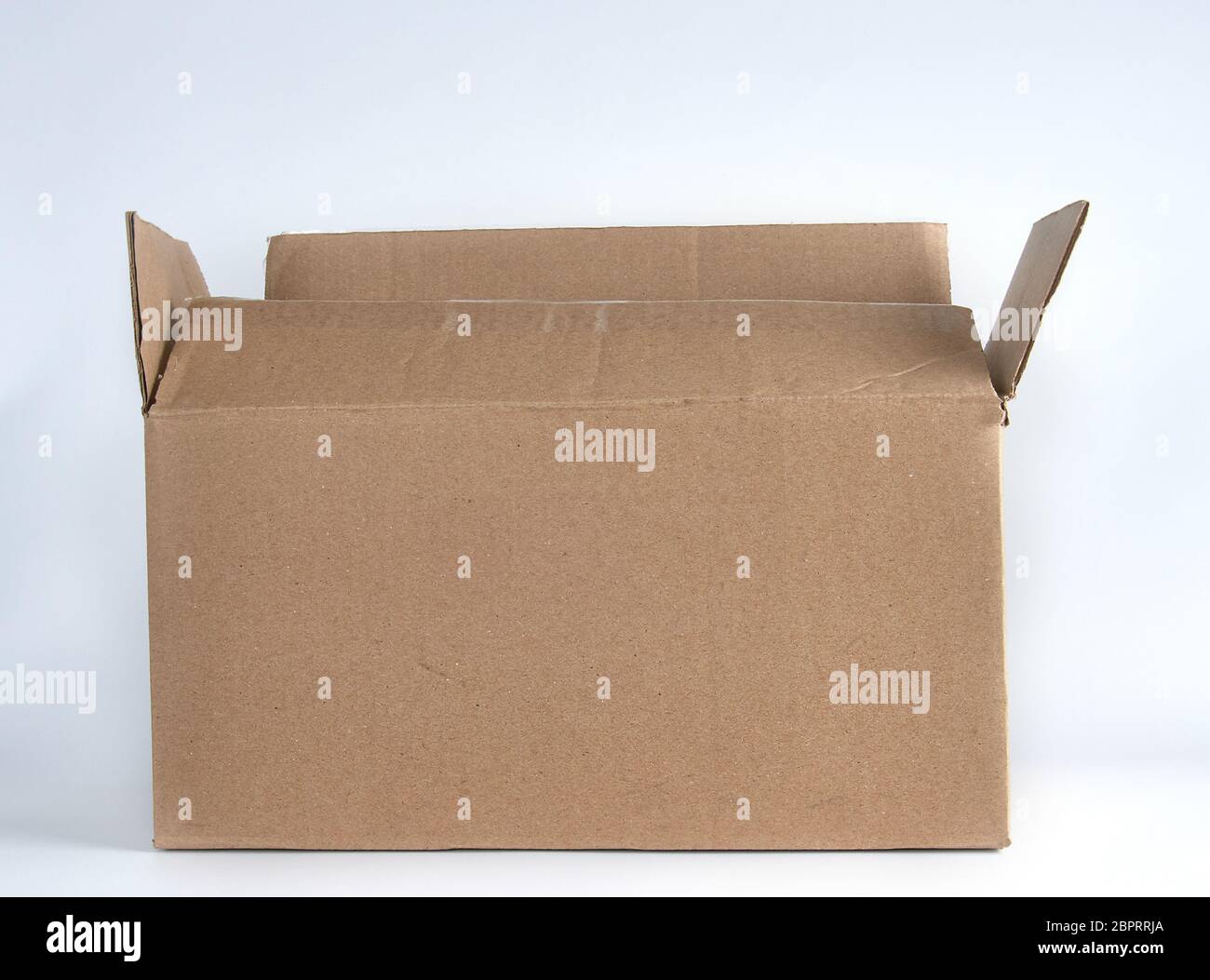open brown paper box on white background Stock Photo - Alamy