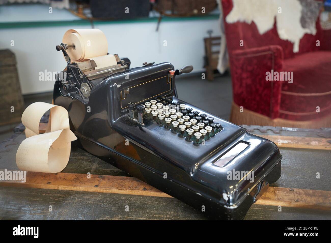 Vinteg calculator and cash register on a counter Stock Photo Alamy