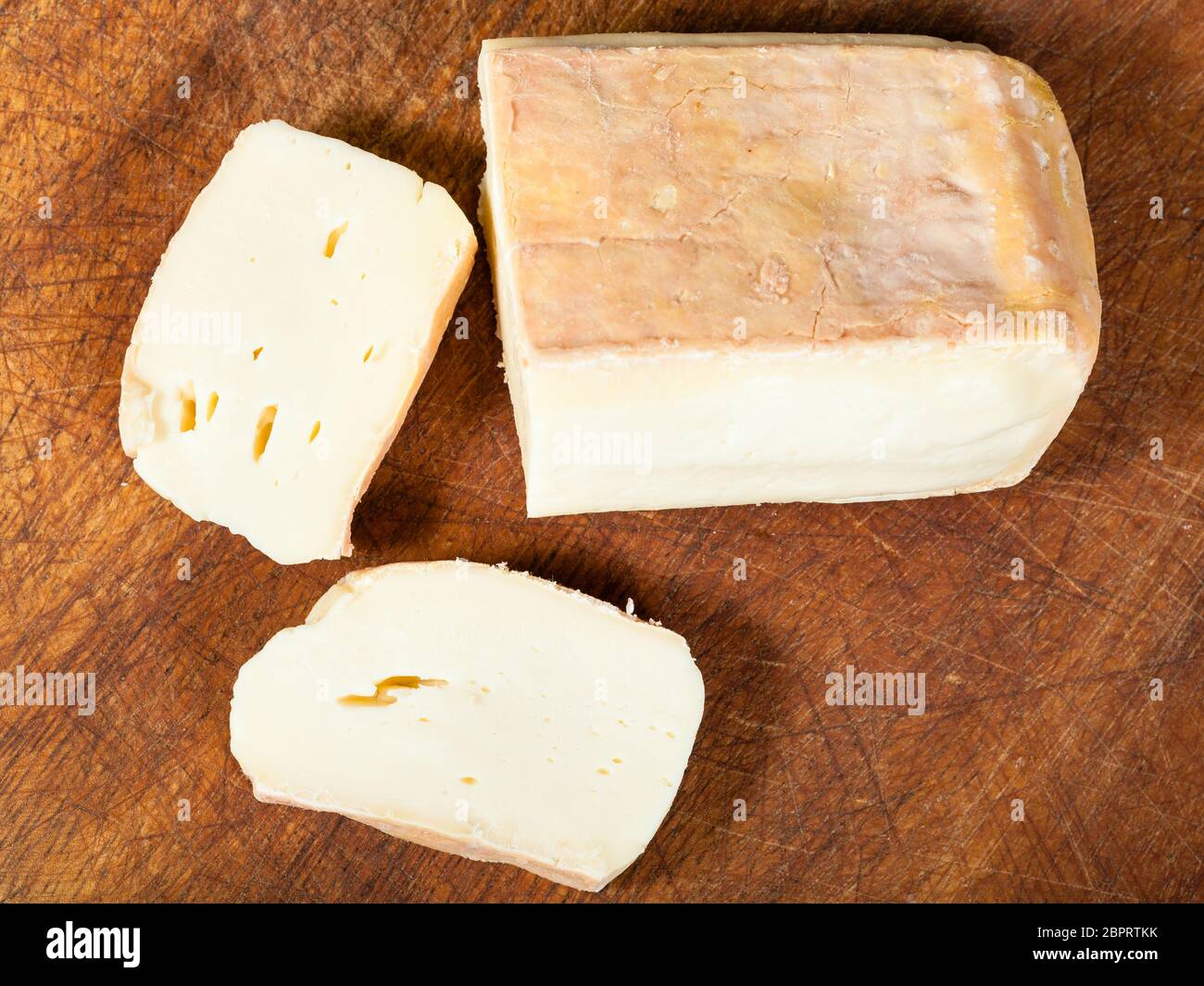 top view of sliced local italian Taleggio cheese from cow's full milk