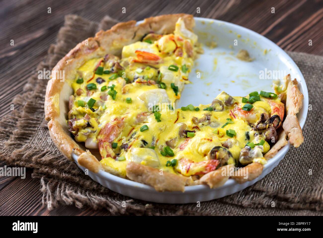 Seafood pie with saffron cream sauce Stock Photo Alamy