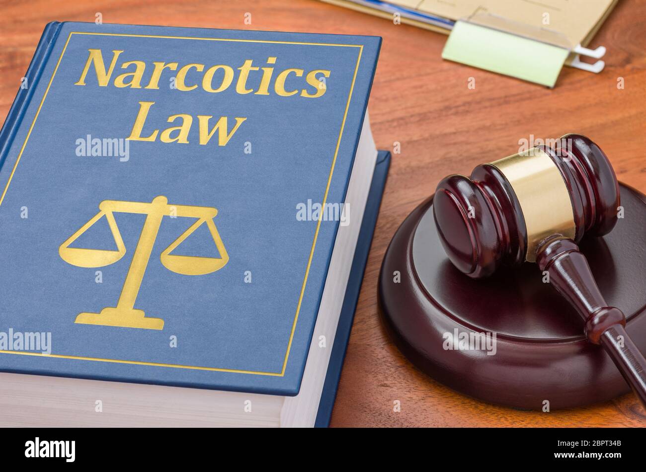 A law book with a gavel  - Narcotics Law Stock Photo