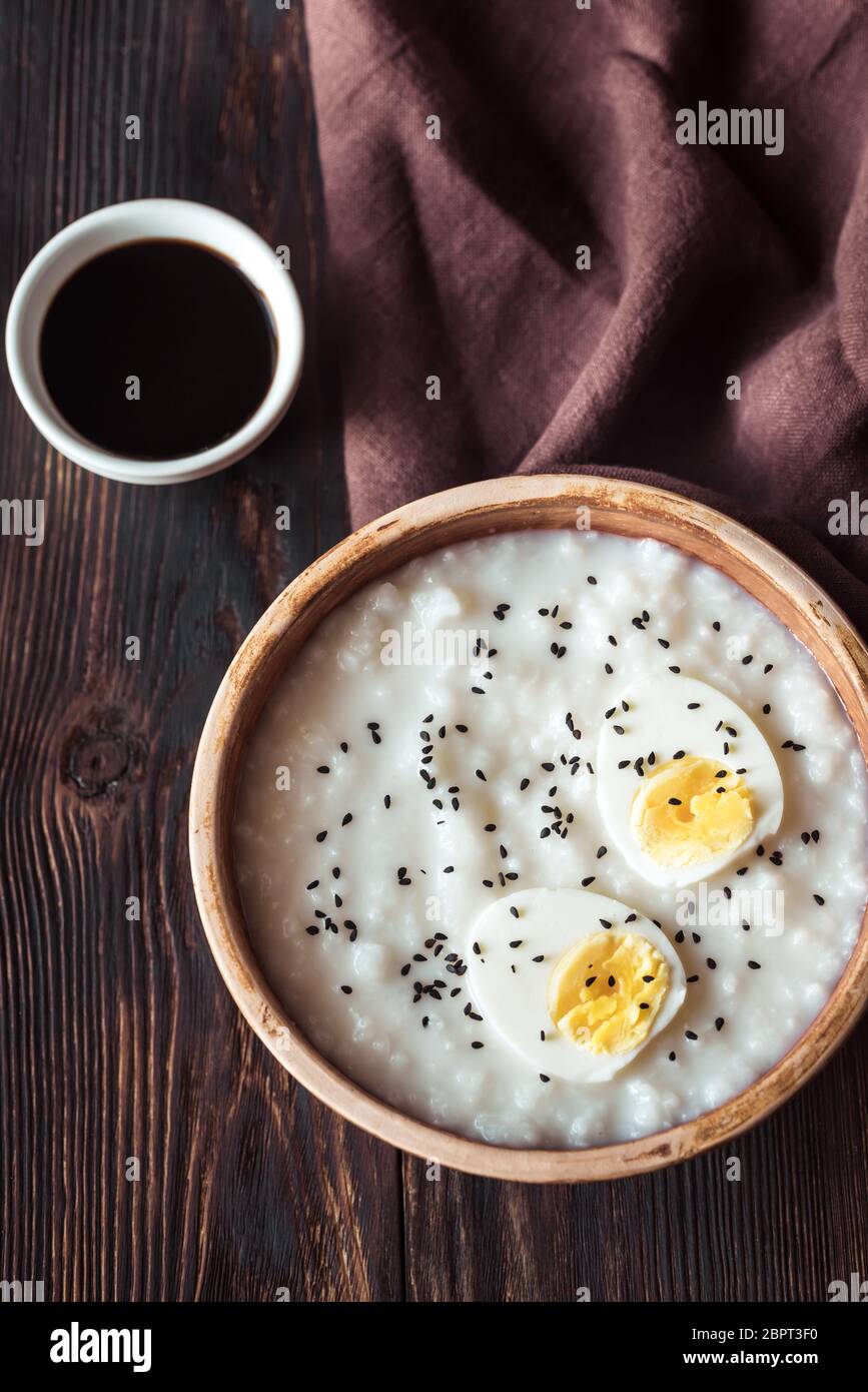 Bowl of congee - Asian rice porridge Stock Photo - Alamy