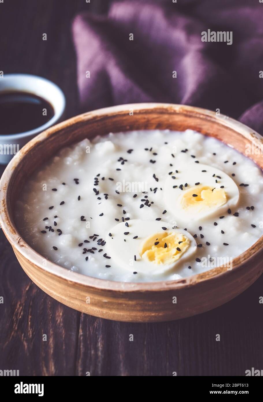 Bowl of congee - Asian rice porridge Stock Photo - Alamy
